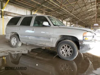 2004 GMC Yukon SLE with VIN 1GKEC13V04R253528, listed as a Copart auction lot 82235244 with 245,584 mi miles and Salvage Title. Bid and sale history available at carsss.com. Image 4.