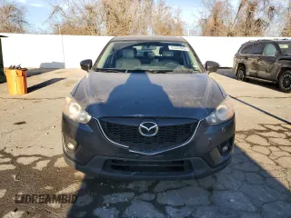 2015 Mazda CX-5 Touring with VIN JM3KE2CY0F0439125, listed as a Copart auction lot 43324945 with 210,404 mi miles and Clean Title. Bid and sale history available at DreamBid. Image 5.