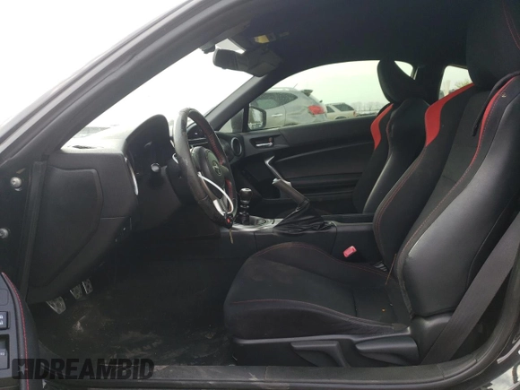 2014 Scion FR-S z VIN JF1ZNAA19E9709220, wystawiony jako Copart lot #54389725 z przebiegiem 123 443 mil mil oraz Szkoda całkowita • Salvage title. Historia ofert i sprzedaży dostępna na DreamBid. Obrazek 7.