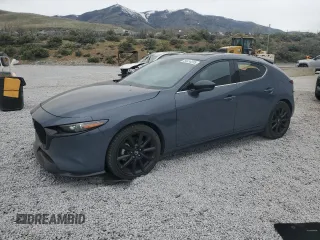 2021 Mazda 3 Premium Plus z VIN JM1BPBNY9M1331934, wystawiony jako Copart lot #54414235 z przebiegiem 74 091 mil mil oraz Szkoda całkowita • Salvage title. Historia ofert i sprzedaży dostępna na DreamBid. Obrazek 1.