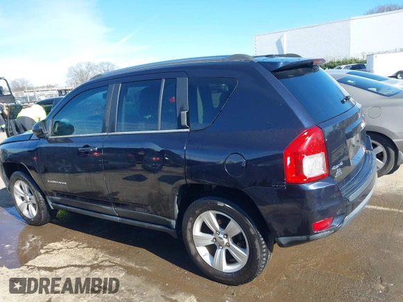 2011 Jeep Compass with VIN 1J4NF1FB6BD180447, listed as a IAAI auction lot 41575014 with 130,694 mi miles. Bid and sale history available at carsss.com. Image 14.