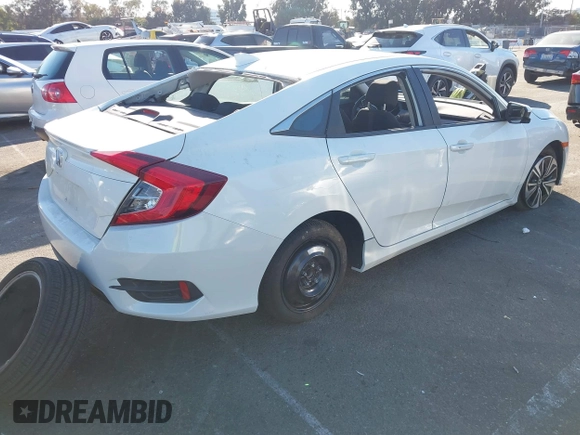 2017 Honda Civic EX-T with VIN 19XFC1E38HE002205, listed as a IAAI auction lot 40891678 with 10,398 mi miles and . Bid and sale history available at DreamBid. Image 4.