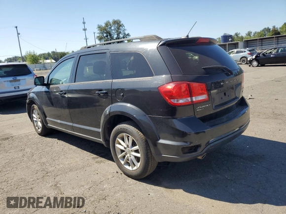 2013 Dodge Journey SXT with VIN 3C4PDDBG6DT639884, listed as a Copart auction lot 64623635 with 206,809 mi miles and Clean title. Bid and sale history available at DreamBid. Image 2.