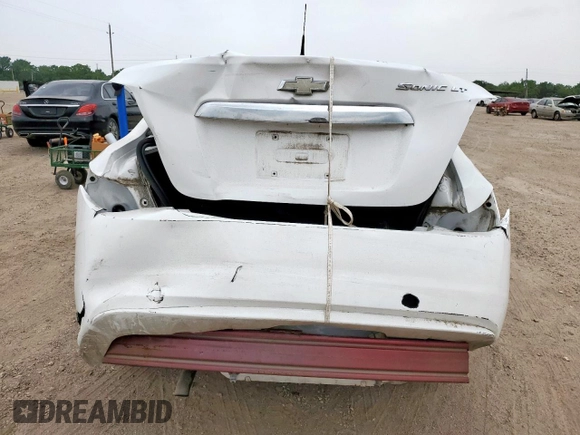 2012 Chevrolet Sonic LT z VIN 1G1JC5SH2C4208687, wystawiony jako Copart lot #57450375 z przebiegiem 155 645 mil mil oraz Szkoda całkowita • Salvage title. Historia ofert i sprzedaży dostępna na DreamBid. Obrazek 6.