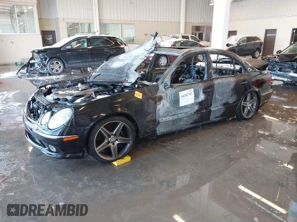 2003 Mercedes-Benz E-Class 5.5L AMG with VIN WDBUF76J73A327193, listed as a IAAI auction lot 41282703 with 1 mi miles. Bid and sale history available at carsss.com. Image 2.