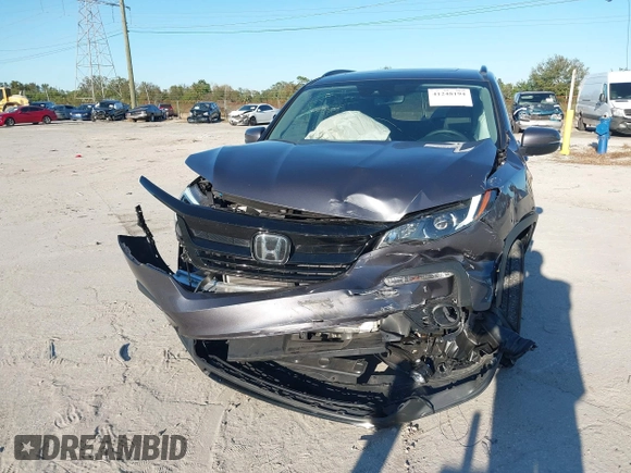 2022 Honda Pilot Special Edition with VIN 5FNYF5H25NB035016, listed as a IAAI auction lot 41248194 with 30,039 mi miles and . Bid and sale history available at DreamBid. Image 6.