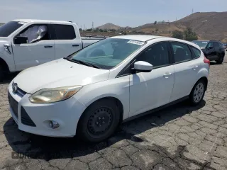 2012 Ford Focus SE z VIN 1FAHP3K29CL258654, wystawiony jako Copart lot #60510935 z przebiegiem 194 284 mil mil oraz Czysty tytuł • Clean title. Historia ofert i sprzedaży dostępna na DreamBid. Obrazek 1.