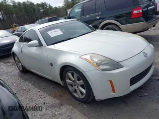 2003 Nissan 350Z Touring z VIN JN1AZ34E93T004717, wystawiony jako IAAI lot #41744005 z przebiegiem 93 097 mil mil oraz . Historia ofert i sprzedaży dostępna na DreamBid. Obrazek 1.
