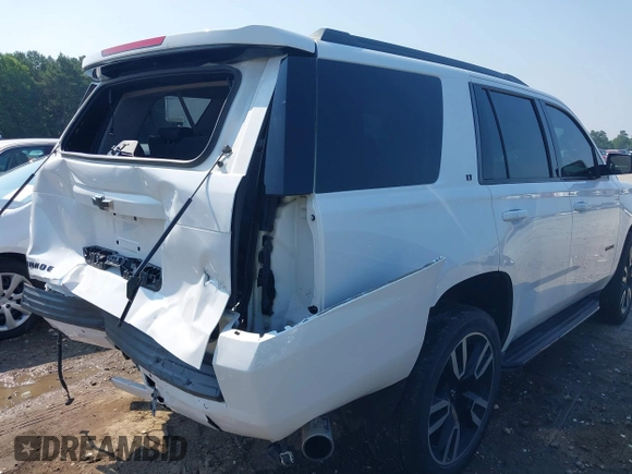 2019 Chevrolet Tahoe LT with VIN 1GNSCBKC2KR128944, listed as a IAAI auction lot 42600686 with 92,980 mi miles and . Bid and sale history available at DreamBid. Image 19.