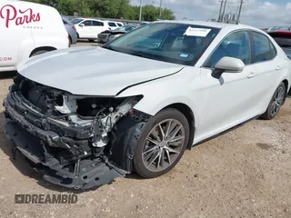 2023 Toyota Camry SE z VIN 4T1T11AK1PU159799, wystawiony jako IAAI lot #42517586 z przebiegiem 51 245 mil mil oraz . Historia ofert i sprzedaży dostępna na DreamBid. Obrazek 17.