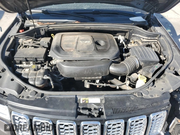 2017 Jeep Grand Cherokee Overland with VIN 1C4RJFCG9HC601806, listed as a Copart auction lot 61786275 with 122,898 mi miles and Salvage title. Bid and sale history available at DreamBid. Image 12.
