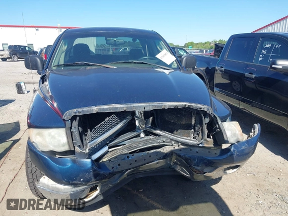 2003 Dodge 1500 ST with VIN 1D7HU18D03J587163, listed as a IAAI auction lot 42059875 with 245,195 mi miles and . Bid and sale history available at DreamBid. Image 12.