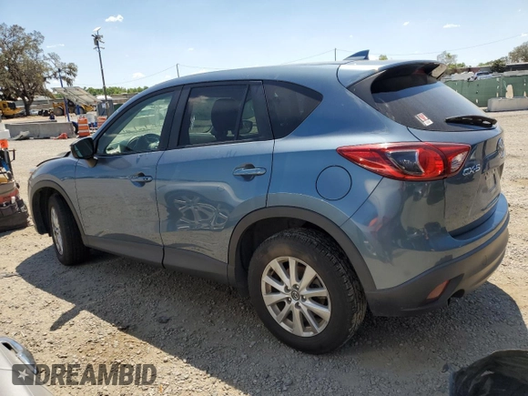 2016 Mazda CX-5 Touring with VIN JM3KE2CY0G0894283, listed as a Copart auction lot 50592065 with 86,400 mi miles and Salvage Title. Bid and sale history available at carsss.com. Image 2.