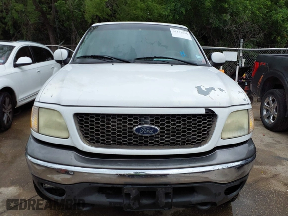 2002 Ford F-150 XLT with VIN 1FTRW08L02KE29411, listed as a IAAI auction lot 42133550 with 270,752 mi miles. Bid and sale history available at carsss.com. Image 6.