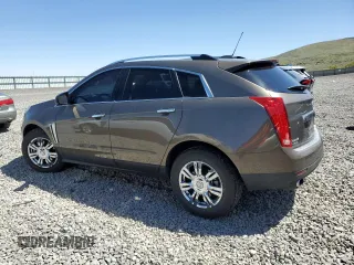 2015 Cadillac SRX Luxury Collection z VIN 3GYFNBE35FS555046, wystawiony jako Copart lot #57589155 z przebiegiem 108 456 mil mil oraz Szkoda całkowita • Salvage title. Historia ofert i sprzedaży dostępna na DreamBid. Obrazek 2.