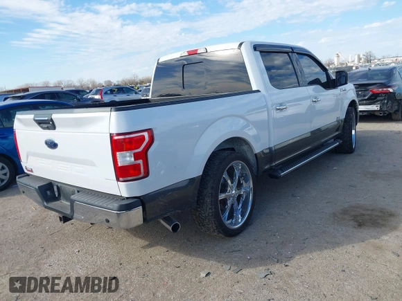 2018 Ford F-150 XL with VIN 1FTEW1C59JKD98218, listed as a IAAI auction lot 41406012 with 103,435 mi miles. Bid and sale history available at carsss.com. Image 4.