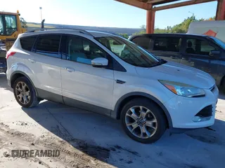 2015 Ford Escape Titanium with VIN 1FMCU0J96FUA48615, listed as a IAAI auction lot 39482355 with 186,340 mi miles and . Bid and sale history available at DreamBid. Image 1.