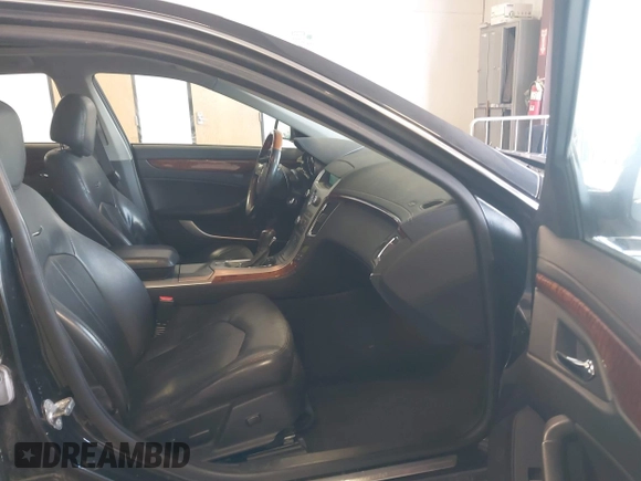 2011 Cadillac CTS Performance with VIN 1G6DL5ED6B0131490, listed as a IAAI auction lot 41980231 with 75,040 mi miles and . Bid and sale history available at DreamBid. Image 5.