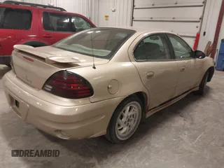 2004 Pontiac Grand Am SE1 with VIN 1G2NF52E04M704082, listed as a IAAI auction lot 41536059 with 207,958 mi miles. Bid and sale history available at carsss.com. Image 4.