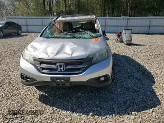 2013 Honda CR-V EX-L z VIN 2HKRM4H73DH616420, wystawiony jako Copart lot #54659295 z przebiegiem 176 725 mil mil oraz Szkody całkowita. Historia ofert i sprzedaży dostępna na DreamBid. Obrazek 14.
