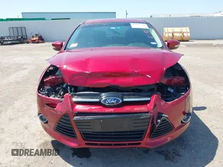2013 Ford Focus Titanium with VIN 1FADP3J23DL334161, listed as a IAAI auction lot 41987758 with 117,665 mi miles and . Bid and sale history available at carsss.com. Image 12.