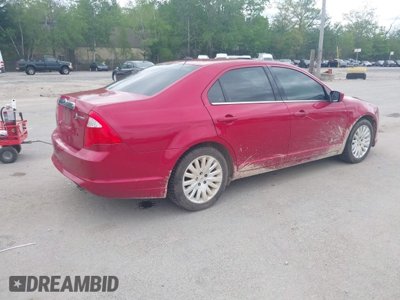 2012 Ford Fusion Hybrid with VIN 3FADP0L38CR218345, listed as a IAAI auction lot 42288247 with 217,118 mi miles and . Bid and sale history available at DreamBid. Image 4.