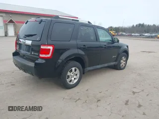 2011 Ford Escape Hybrid with VIN 1FMCU5K3XBKB73534, listed as a IAAI auction lot 41795069 with 160,000 mi miles and . Bid and sale history available at DreamBid. Image 4.