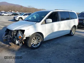 2019 Dodge Grand Caravan SXT with VIN 2C4RDGCG2KR775177, listed as a IAAI auction lot 41363146 with 129,739 mi miles and . Bid and sale history available at DreamBid. Image 18.