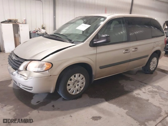 2006 Chrysler Town & Country SWB with VIN 1A4GP45R06B745699, listed as a IAAI auction lot 39490821 with 116,876 mi miles. Bid and sale history available at carsss.com. Image 2.