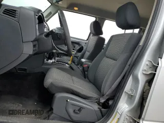 2010 Jeep Commander Sport with VIN 1J4RG4GK2AC121821, listed as a Copart auction lot 57793545 with 171,405 mi miles and Salvage title. Bid and sale history available at DreamBid. Image 7.