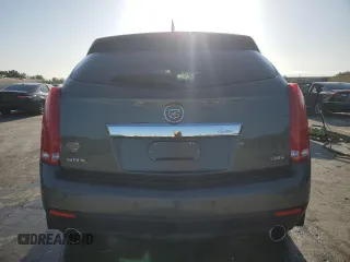 2013 Cadillac SRX Performance Collection with VIN 3GYFNDE39DS568052, listed as a Copart auction lot 52027255 with 96,579 mi miles and Salvage Title. Bid and sale history available at carsss.com. Image 6.