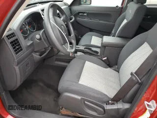 2009 Jeep Liberty Sport with VIN 1J8GN28K89W551684, listed as a Copart auction lot 76122674 with 14,631 mi miles and Salvage Title. Bid and sale history available at DreamBid. Image 7.