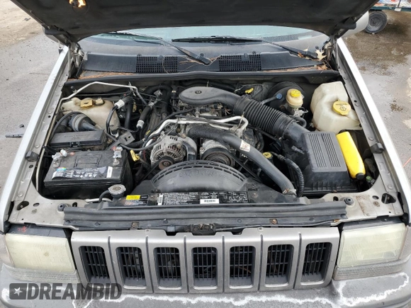 1997 Jeep Grand Cherokee Limited with VIN 1J4GZ78Y0VC682949, listed as a Copart auction lot 82152424 with 194,576 mi miles and Salvage Title. Bid and sale history available at carsss.com. Image 12.