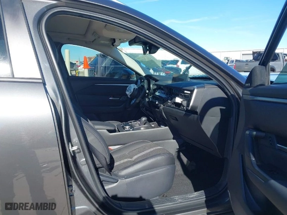 2025 Mazda CX-50 2.5 S Premium Package with VIN 7MMVABDMXSN309279, listed as a IAAI auction lot 41221196 with 1 mi miles. Bid and sale history available at carsss.com. Image 5.