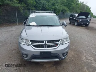 2017 Dodge Journey SXT with VIN 3C4PDDBG8HT577782, listed as a IAAI auction lot 42409731 with 136,618 mi miles and . Bid and sale history available at DreamBid. Image 11.