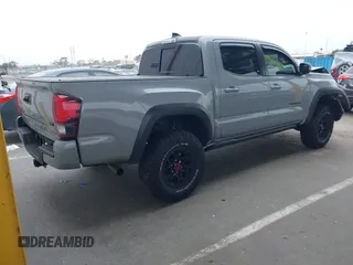 2021 Toyota Tacoma SR z VIN 5TFCZ5AN5MX281428, wystawiony jako IAAI lot #41893437 z przebiegiem 36 204 mil mil oraz . Historia ofert i sprzedaży dostępna na DreamBid. Obrazek 4.