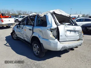 2005 Honda Pilot EX with VIN 5FNYF18405B063686, listed as a IAAI auction lot 39906381 with 241,904 mi miles. Bid and sale history available at carsss.com. Image 3.