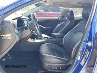 2013 Kia Optima SX z VIN 5XXGR4A63DG181193, wystawiony jako Copart lot #57774095 z przebiegiem 84 916 mil mil oraz Szkoda całkowita • Salvage title. Historia ofert i sprzedaży dostępna na DreamBid. Obrazek 7.
