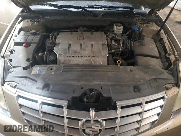 2006 Cadillac DTS 1SC z VIN 1G6KD57Y76U141402, wystawiony jako Copart lot #58715675 z przebiegiem 148 042 mil mil oraz Szkoda całkowita • Salvage title. Historia ofert i sprzedaży dostępna na DreamBid. Obrazek 11.