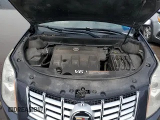 2016 Cadillac SRX Luxury Collection z VIN 3GYFNBE3XGS538339, wystawiony jako Copart lot #59485375 z przebiegiem 125 765 mil mil oraz Czysty tytuł • Clean title. Historia ofert i sprzedaży dostępna na DreamBid. Obrazek 12.