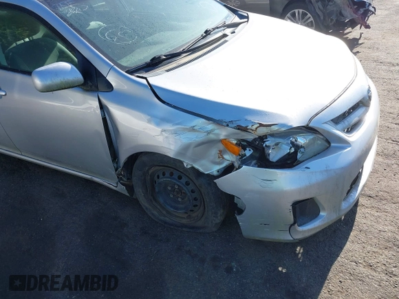 2011 Toyota Corolla L with VIN 2T1BU4EE9BC713402, listed as a IAAI auction lot 42044806 with 121,894 mi miles. Bid and sale history available at carsss.com. Image 6.