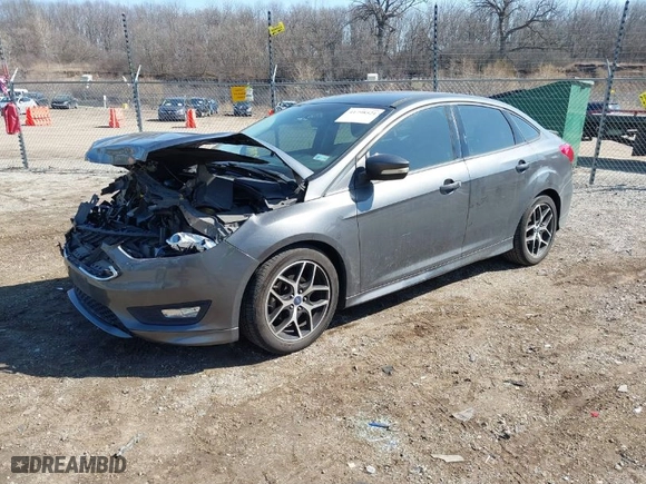 2016 Ford Focus SE with VIN 1FADP3F2XGL282444, listed as a IAAI auction lot 41798521 with 100,959 mi miles. Bid and sale history available at carsss.com. Image 2.