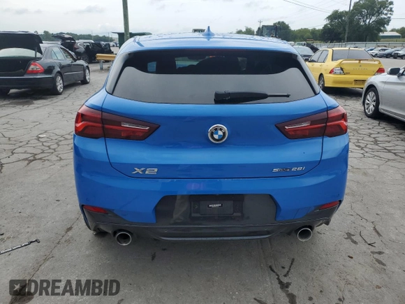 2023 BMW X2 sDrive28i with VIN WBXYH9C08P5V32303, listed as a Copart auction lot 64951994 with 22,462 mi miles and Salvage Title. Bid and sale history available at carsss.com. Image 6.