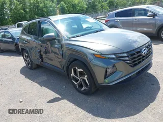 2022 Hyundai Tucson SEL z VIN 5NMJF3AE5NH142494, wystawiony jako IAAI lot #42295673 z przebiegiem 42 998 mil mil oraz . Historia ofert i sprzedaży dostępna na DreamBid. Obrazek 1.