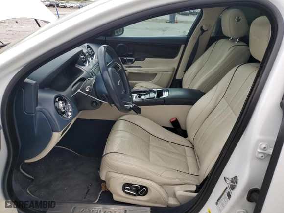 2014 Jaguar XJ with VIN SAJWJ2GD6E8V65987, listed as a Copart auction lot 50091105 with 136,080 mi miles and Clean Title. Bid and sale history available at carsss.com. Image 7.