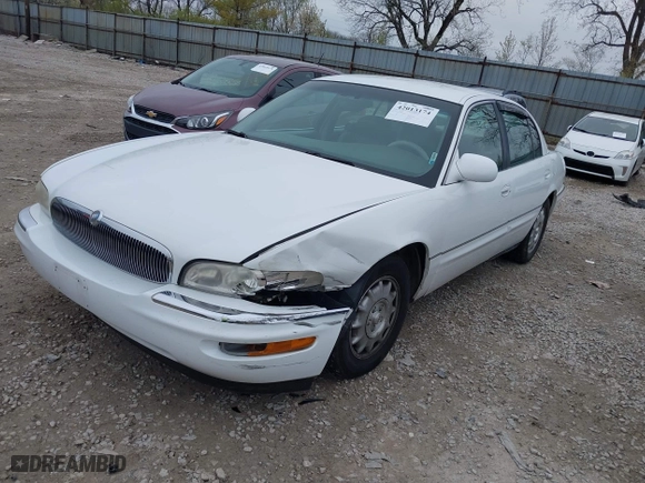 1999 Buick Park Avenue Ultra with VIN 1G4CU5217X4658627, listed as a IAAI auction lot 42013174 with 148,856 mi miles. Bid and sale history available at carsss.com. Image 2.