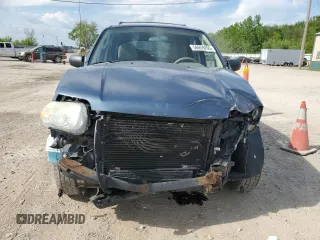 2006 Ford Escape XLT with VIN 1FMCU03196KA23467, listed as a Copart auction lot 56059295 with 162,314 mi miles and Salvage title. Bid and sale history available at DreamBid. Image 5.