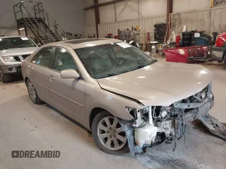 2009 Toyota Camry with VIN 4T4BE46K09R069420, listed as a IAAI auction lot 40201083 with 207,493 mi miles. Bid and sale history available at carsss.com. Image 1.