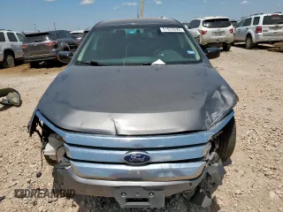 2012 Ford Fusion SE with VIN 3FAHP0HA9CR435931, listed as a Copart auction lot 61633525 with 169,561 mi miles and Salvage title. Bid and sale history available at DreamBid. Image 5.
