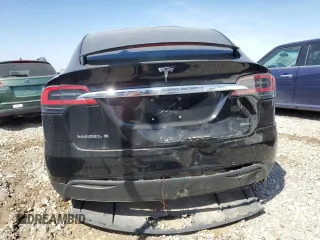 2016 Tesla Model X 70D z VIN 5YJXCBE25GF004035, wystawiony jako Copart lot #43964955 z przebiegiem 127 100 mil mil oraz Szkody całkowita. Historia ofert i sprzedaży dostępna na DreamBid. Obrazek 6.